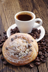Cup of coffee and sweet bun