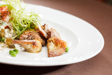 Russian salad with quail