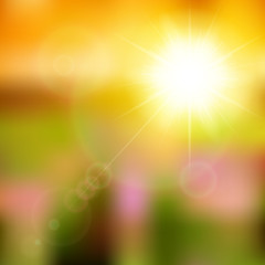 Summer background with sun burst with lens flare.