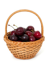 Fototapeta na wymiar sweet cherry in a basket over white