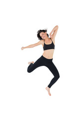 Fototapeta na wymiar Sporty young woman jumping over white background