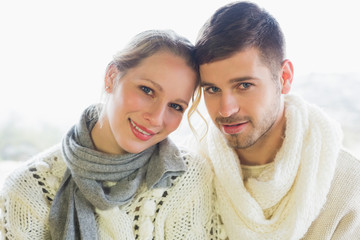 Close-up portrait of a loving couple in winter clothing