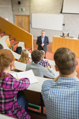 Teacher with students at the lecture hall