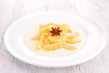 vanilla cream with slice of tangerine