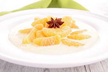 vanilla cream with slice of tangerine