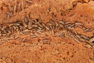 Background of rye bread with caraway seed