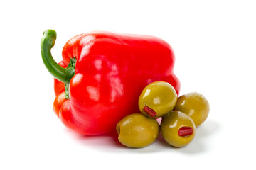Green olives stuffed with red paprika