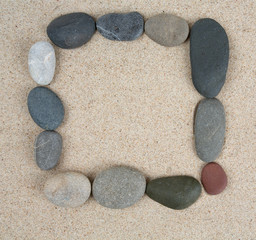 Fototapeta na wymiar pebbles on sea sand