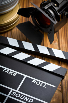 clapper board with movie light