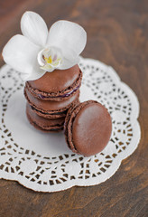 Chocolate macaroon and orchid flower