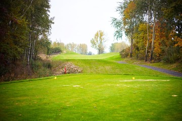 Obraz premium Autumn golf course, landscape view