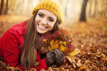 Happy gorgeous woman at autumn season.