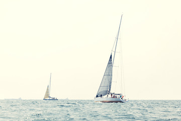 Fototapeta premium Sailing ship yachts with white sails