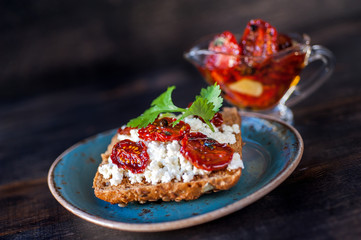 Grain bread with cottage cheese and sun-dried tomatoes