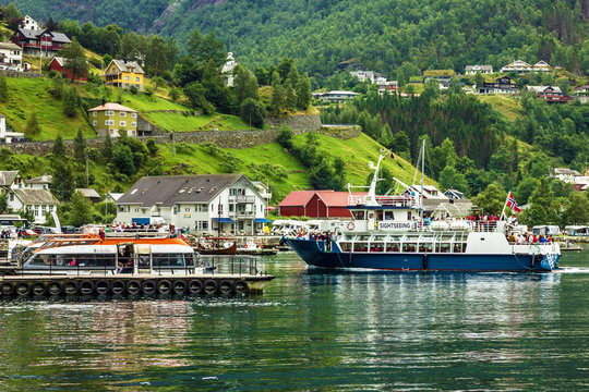 Sightseeing boat in Geiranger seaport, Norway.