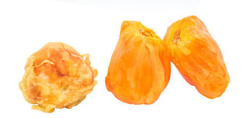 Fresh and fried chempedak arils over white background.