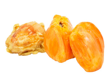 Fresh and fried chempedak arils over white background.