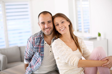 in love couple smiling towards camera