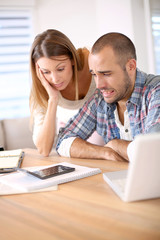 Couple being worried about their budget