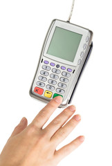 Payment terminal - a finger entering the PIN code