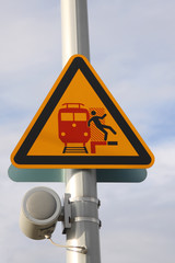 warning sign at a platform