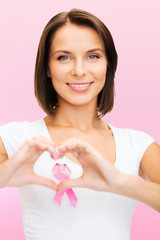 woman with pink cancer awareness ribbon