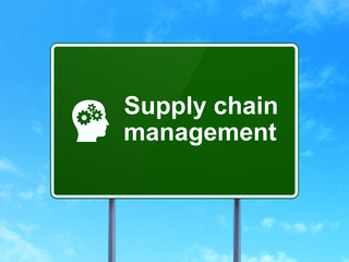 Marketing concept: Supply Chain Management and Head With Gears
