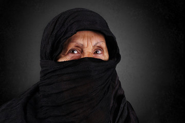 Senior muslim woman with black hijab