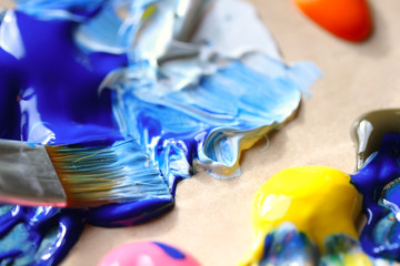 Closeup of brush and palette.