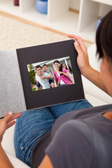 Woman With Photo Album