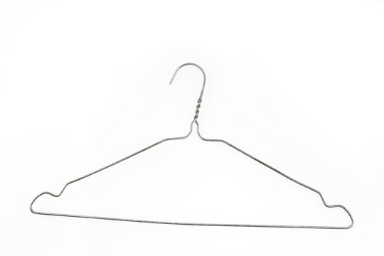 A Single Silver Wire Hanger On A White Background Stock Photo