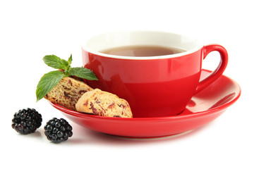 Cup of tea with cookies and blackberry isolated on white