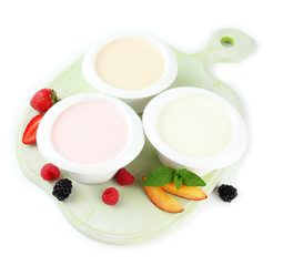 Delicious yogurt with fruit and  berries isolated on white