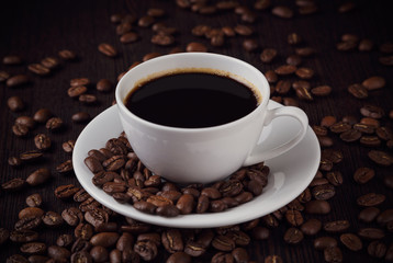 Aromatic coffee in a white cup