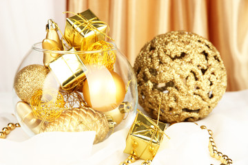 Christmas decorations in glass vase close up