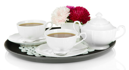 Cups of tea on tray isolated on white