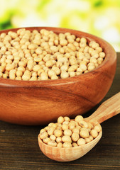 Soy beans on table on bright background