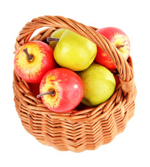 Small apples in wicker basket, isolated on white