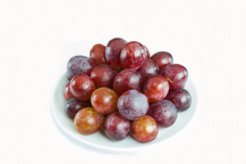 red grapes isolated on white background
