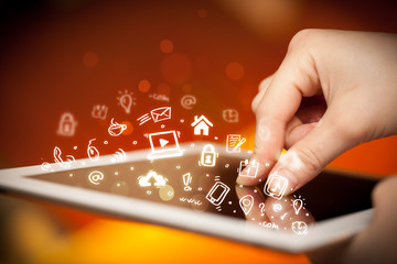 Finger pointing on tablet pc, social media concept