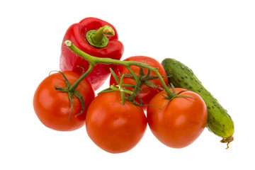 Red pepper, tomato branch and cucumber