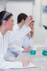 Researchers working on experiments in the laboratory