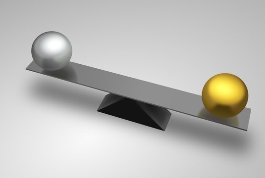 Metal seesaw with golden and silver balls