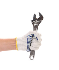 Obraz premium Wrench in red gloves.