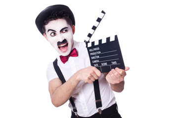 Man with movie clapper isolated on white