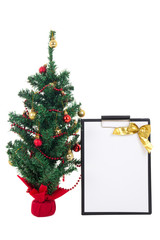 decorated christmas tree and gift list on white background