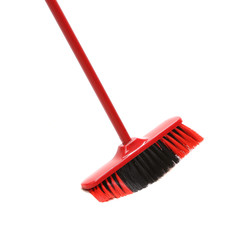 Close up of red black broom.