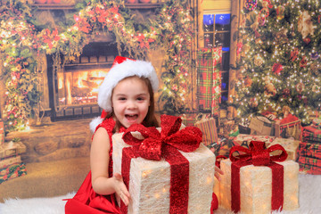 Christmas, happy child holding presents