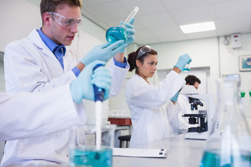 Fototapeta premium Researchers carrying out experiments in the lab