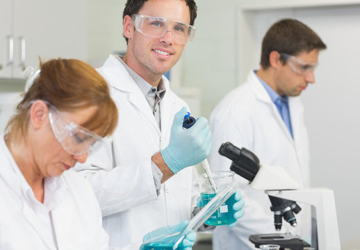 Group of scientists working at the laboratory